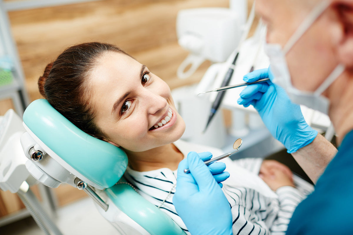 Corsodyl mouthwash daily - Smiling patient of dentist