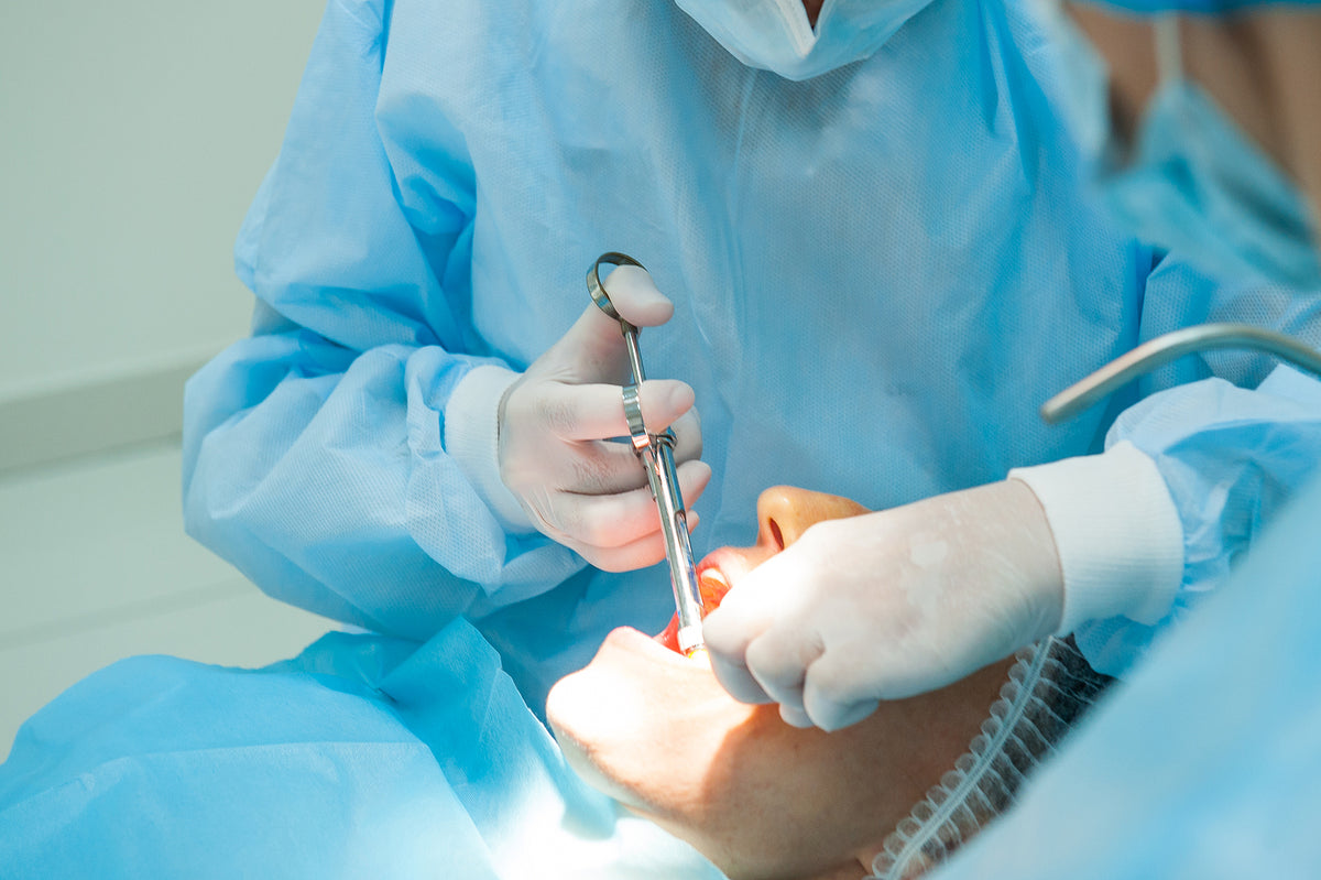 Dental composite syringe - Close up dental surgery process