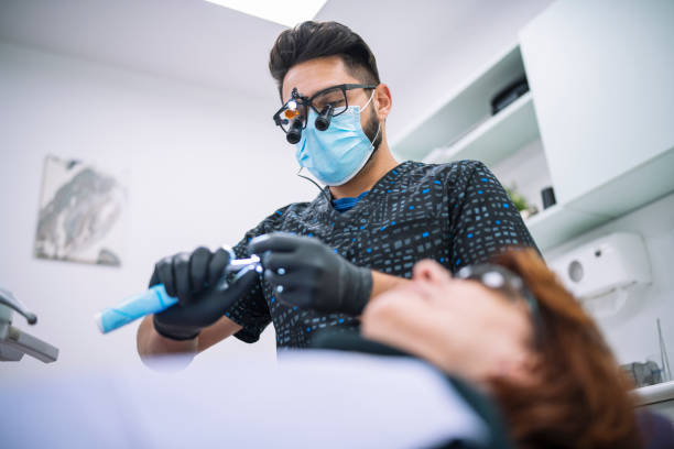 dentist wearing dental loupes